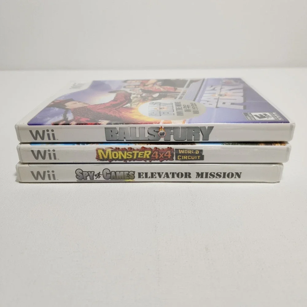 Lot Of 3 Nintendo Wii Games Monster 4X4/ Balls Of Fury/ Spy Games‎